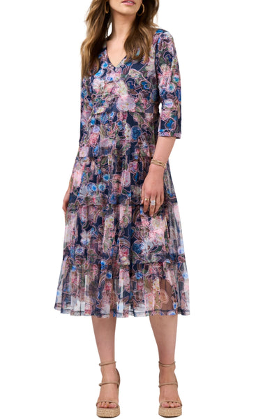 Woman wearing a floral dress on a white background