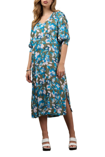 Woman wearing a floral dress on a white background