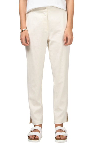 Person wearing beige pants on a white background